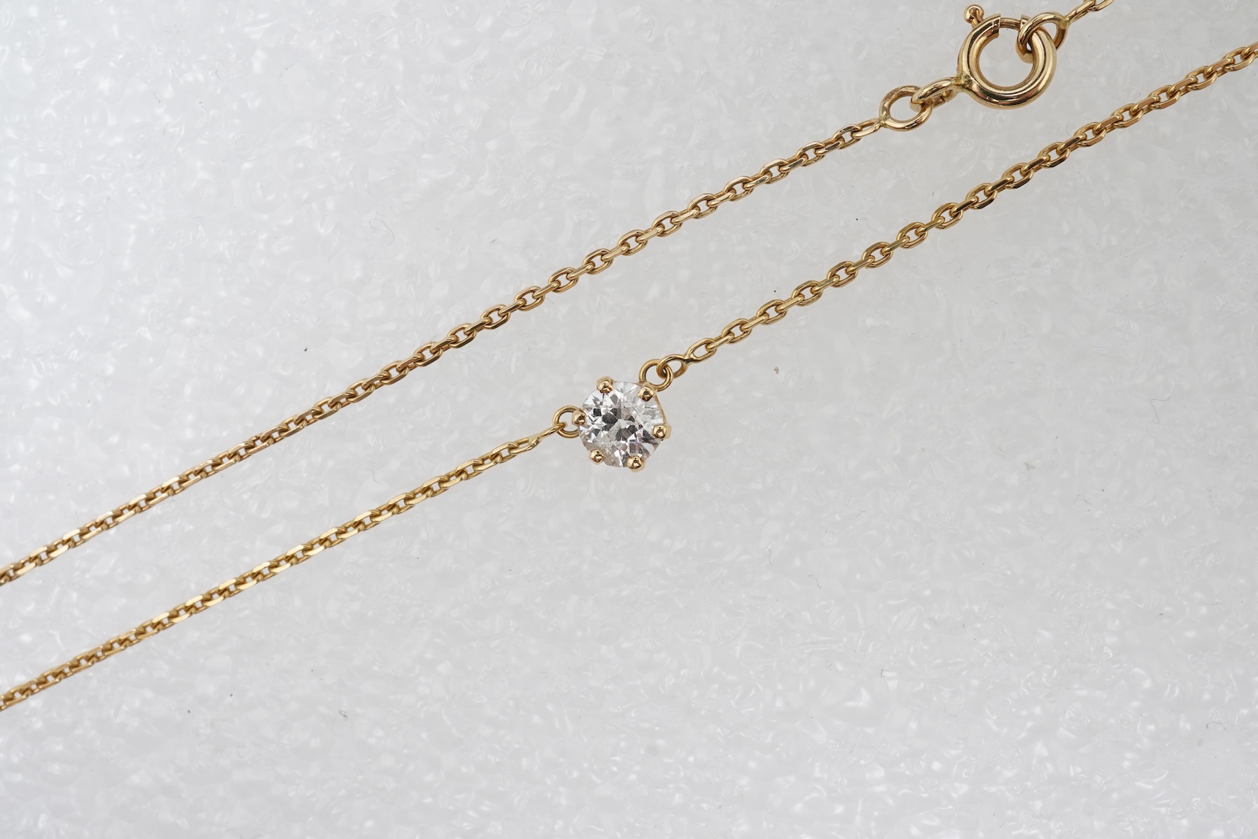 A diamond pendant necklace